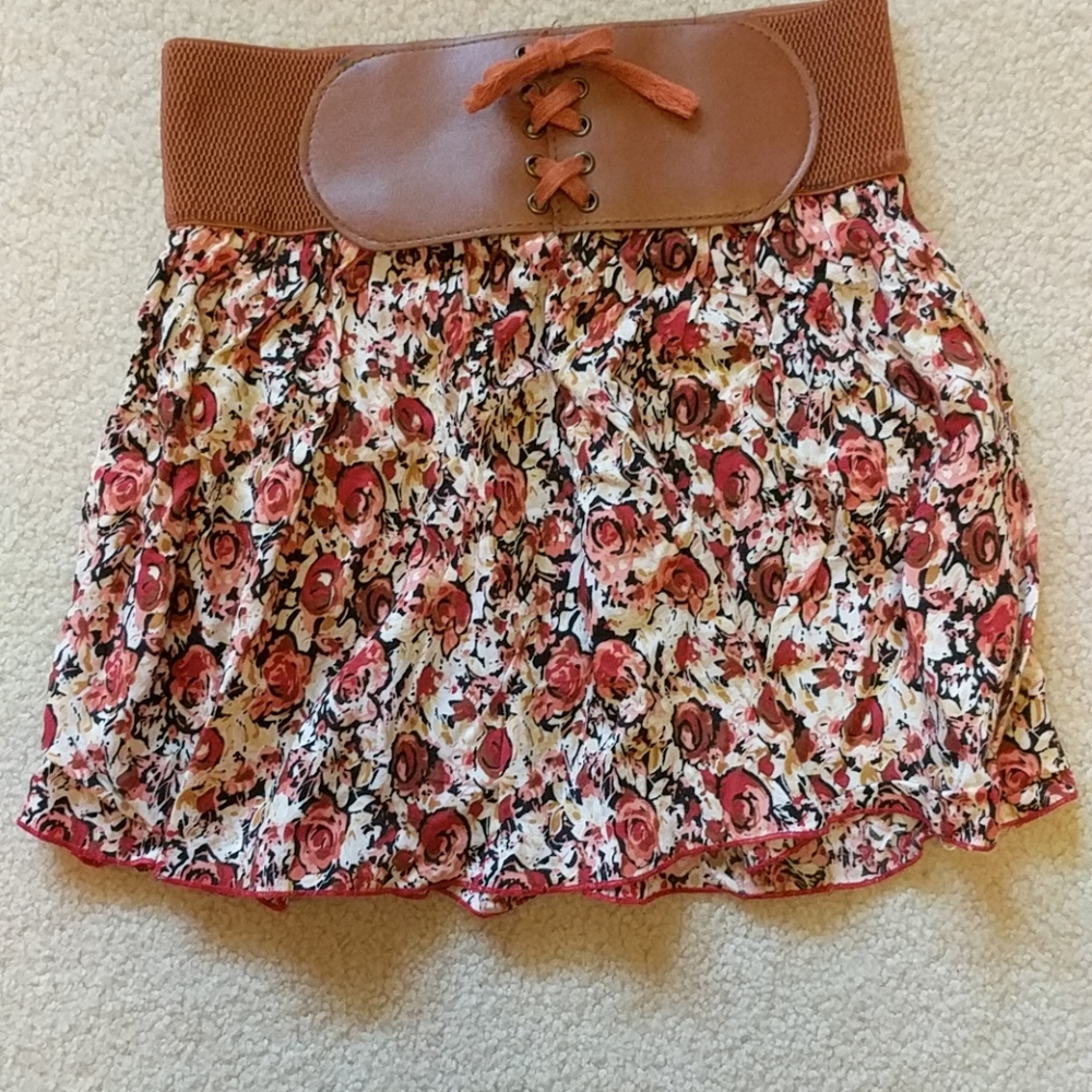 Fun short skirt. Multi colored.  Elastic waist.